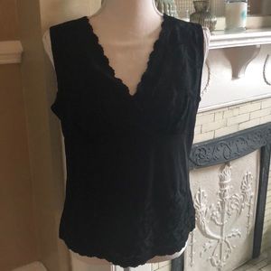 V-Neck top with Lace details.